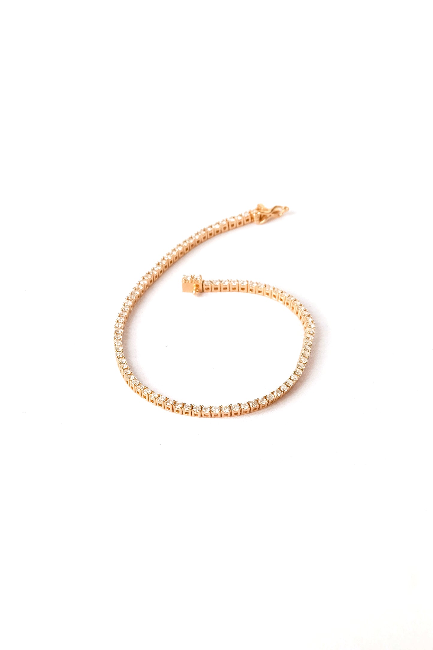 Pink gold & diamond “tennis” bracelet